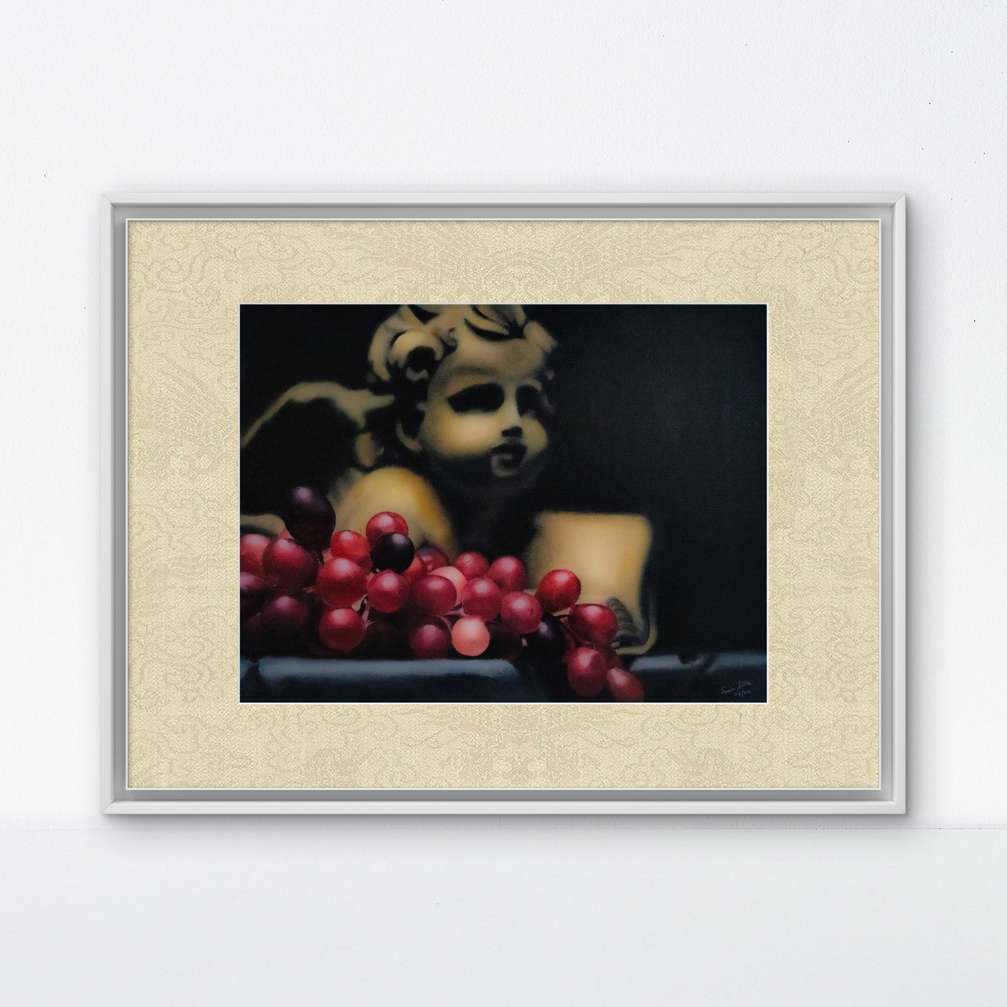 Angel With red grapes