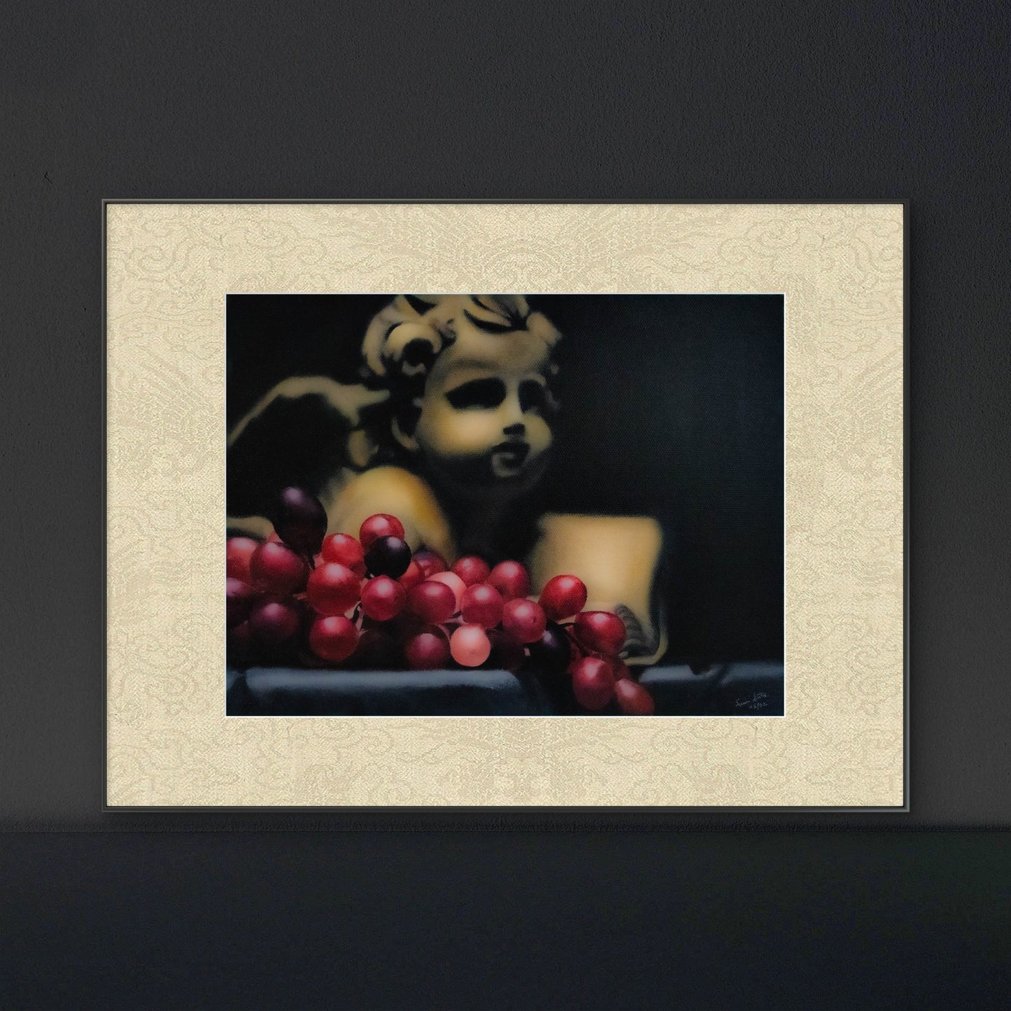 Angel With red grapes