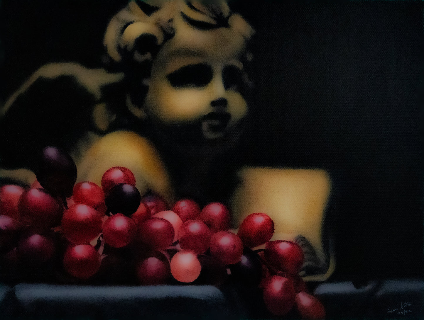 Angel With red grapes